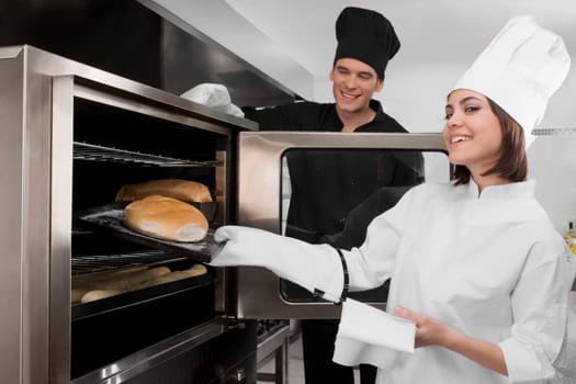Chefs preparing food in the kitchen