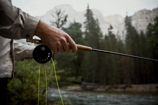 Man holding a fishing rod