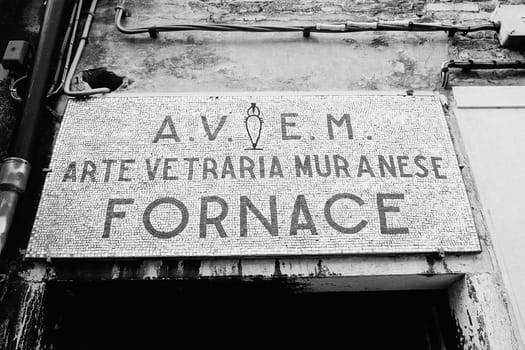 Low angle view of an information board at the entrance of a building, Venice, Veneto, Italy