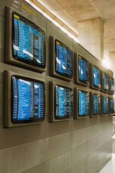 Arrival departure screens at an airport, Charles de Gaulle International Airport, Paris, France