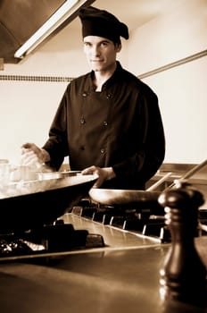 Chef cooking food in the kitchen