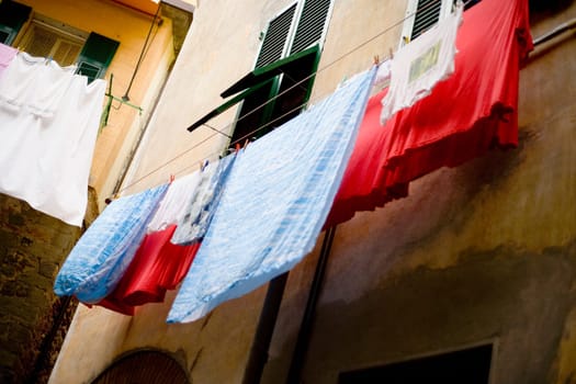Clothes hanging to dry on a clothesline, Cinque Terre, La Spezia, Liguria, Italy