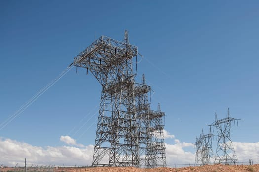 Electricity pylons in a field, Glen Canyon Dam, Lake Powell, Colorado River, Page, Arizona, USA