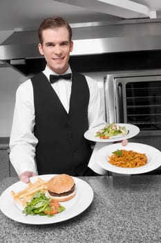 Waiter holding plates of foods