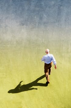 High angle view of a man walking in a park, New York City, New York State, USA