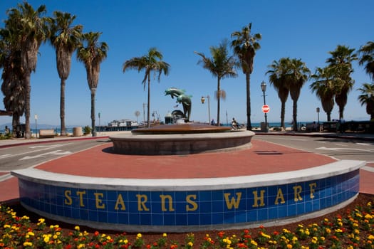 Fountain with palm tree in the background, Santa Barbara Fountain, StearnŽs Wharf, Santa Barbara, California, USA