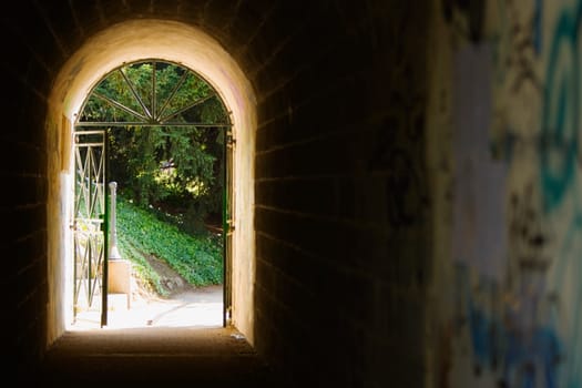Garden viewed through an archway, Pont Yssoir, Sarthe River, Le Mans, Sarthe, Pays_de_la_Loire, France