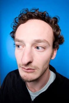 Close_up of a young man thinking