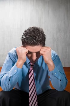 Businessman suffering from a headache