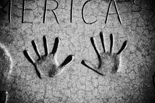 Close_up of handprints in cement at a theater, GraumanŽs Chinese theater, Hollywood Boulevard, Hollywood, Los Angeles, California, USA