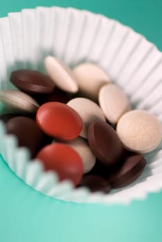 Close_up of pills in a bowl