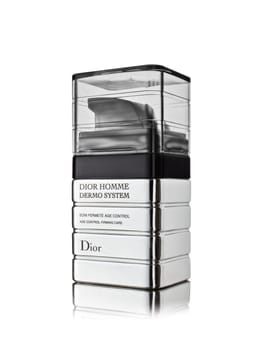 St.Petersburg, Russia - March 2020 - Bottle of serum Dior Homme Dermo System on white background. Age control, firming care. Product  from Christian Dior