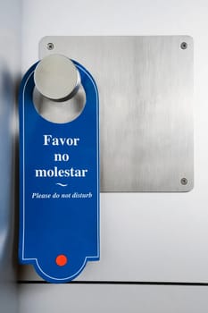 Close_up of a Do Not Disturb sign on a doorknob
