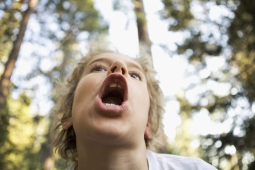 Low angle view of a girl shouting