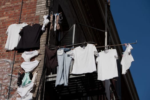Low angle view of clothes drying on a house, San Francisco, California, USA