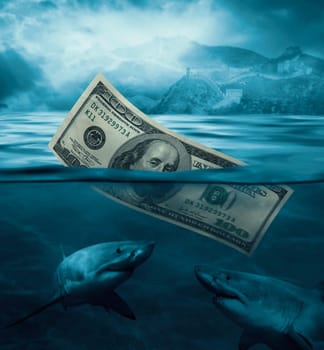 Close_up of one hundred dollar bill sinking in water