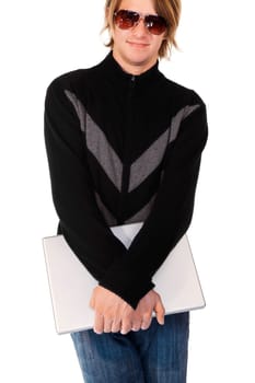Young man holding a laptop and smiling