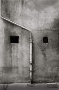 Close_up of a pipe mounted on a wall