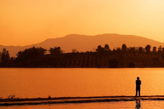 Silhouette of a person standing, Chiang Rai, Amphoe Mueang, Chiang Rai Province, Thailand