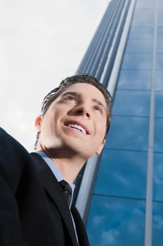 Low angle view of a businessman smiling