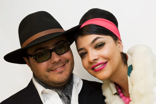 Portrait of a mid adult man and a young woman smiling