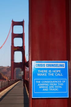Crisis Counseling sign on a bridge, Golden Gate Bridge, San Francisco Bay, San Francisco, California, USA