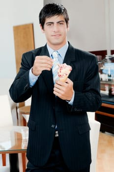 Businessman eating an ice cream