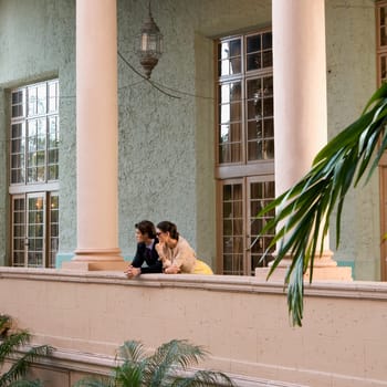Couple standing in the balcony, Biltmore Hotel, Coral Gables, Florida, USA