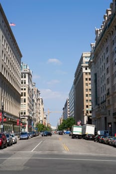 Buildings along the road in a city, Washington DC, USA