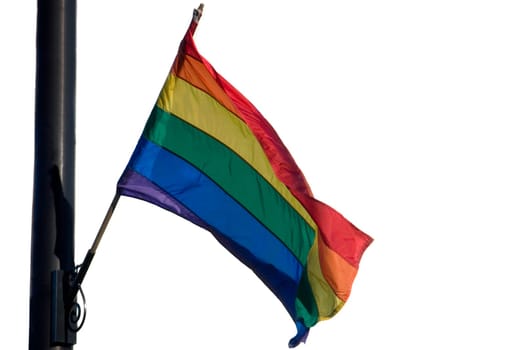 Low angle view of a gay pride flag fluttering, Boys Town, Chicago, Illinois, USA