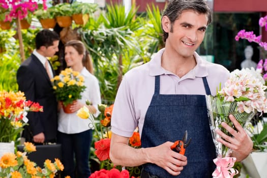 Florist pruning flowers