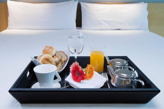 Breakfast tray on the bed