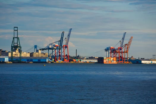 Cranes and cargo containers at a commercial dock, Hudson River, Brooklyn, New York City, New York State, USA