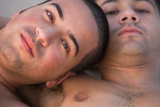 Portrait of a gay couple romancing
