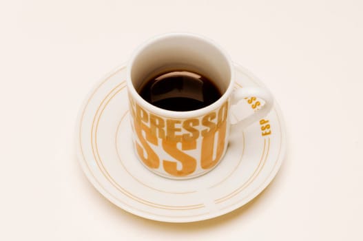Close_up of a cup of black coffee