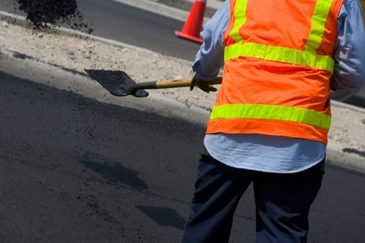 Rear view of a construction worker at a road construction site, Biscayne Boulevard, Miami, Florida, USA