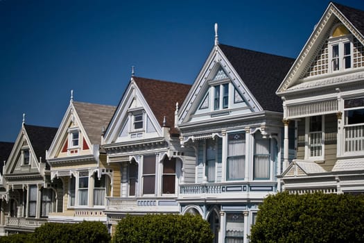 Row of Victorian style houses in a city, Alamo Square, Painted Ladies, San Francisco, California, USA