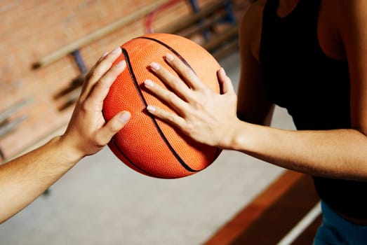 Close_up of two basketball players playing