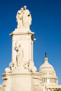 Low angle view of statues in front of a government building, State Capitol Building, The Mall, Washington DC, USA