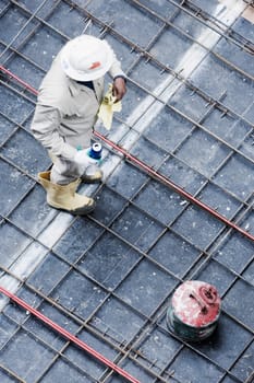 High angle view of a construction worker standing at a construction site
