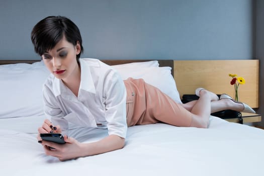 Businesswoman using a personal data assistant