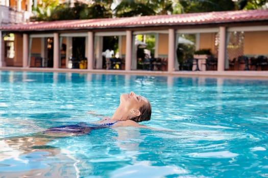 Woman in a swimming pool, Biltmore Hotel, Coral Gables, Florida, USA