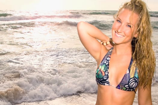 Close_up of a young woman smiling on the beach
