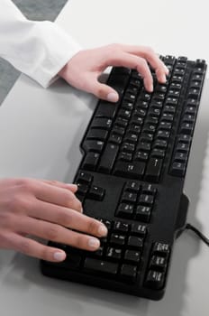 Close_up of a businesswomanŽs hand typing on a computer keyboard