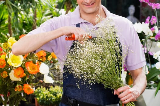 Florist pruning flowers