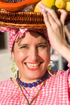 Portrait of a mature woman selling fruits