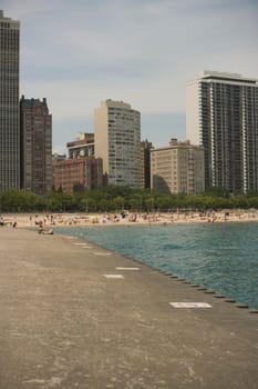 Tourists on the beach, Oak Street Beach, Lake Shore Drive, Chicago, Illinois, USA