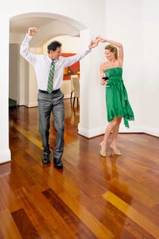 Couple celebrating in a house
