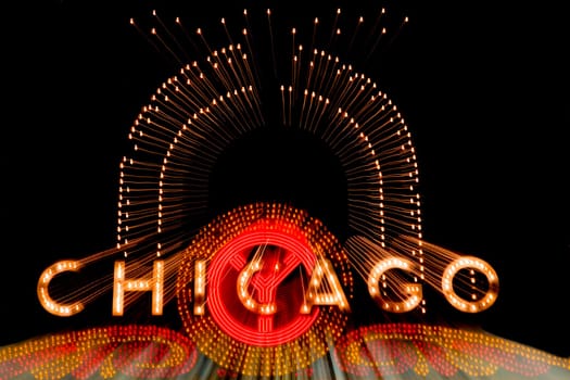Close_up of Chicago neon sign lit up at night, Chicago Theatre, Chicago, Illinois, USA