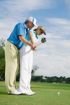 Golf instructor teaching golf to a woman, Biltmore Golf Course, Coral Gables, Florida, USA